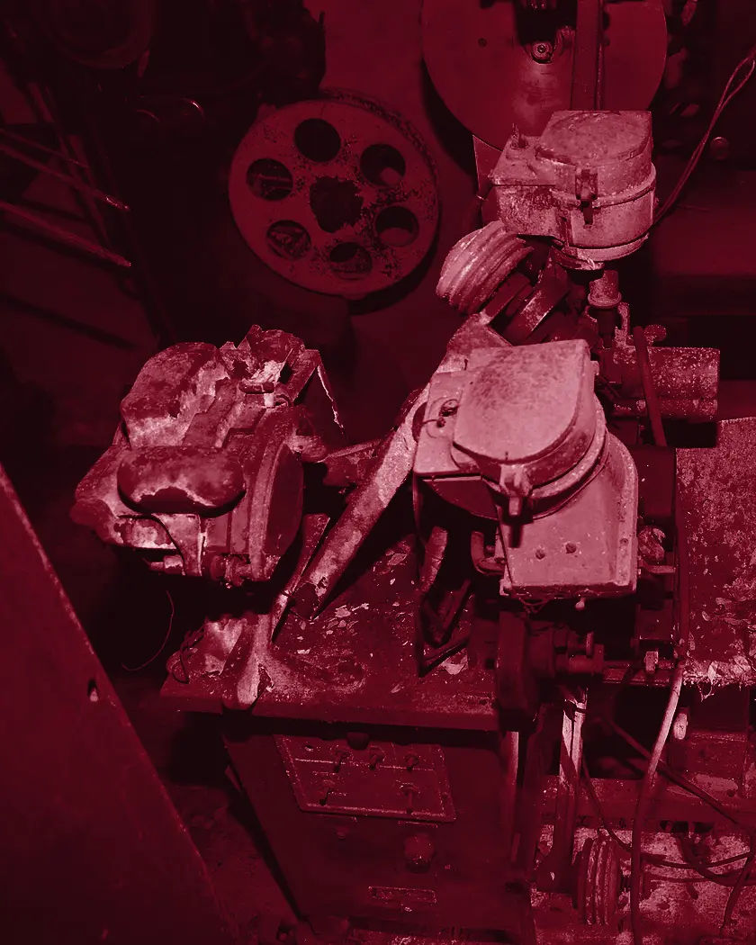 A 16mm Moviola editing machine, its reels and film gate seen close.